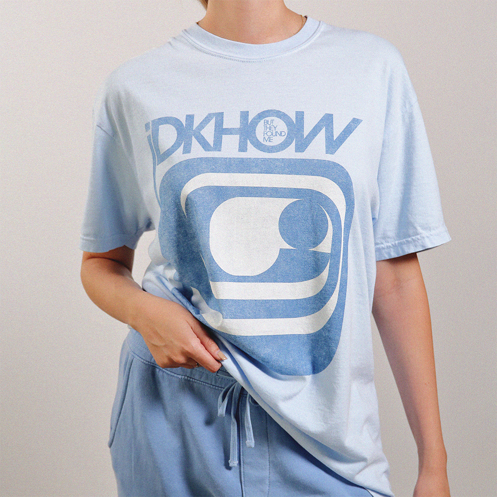 I Dont Know How But They Found Me blue swirl tee.